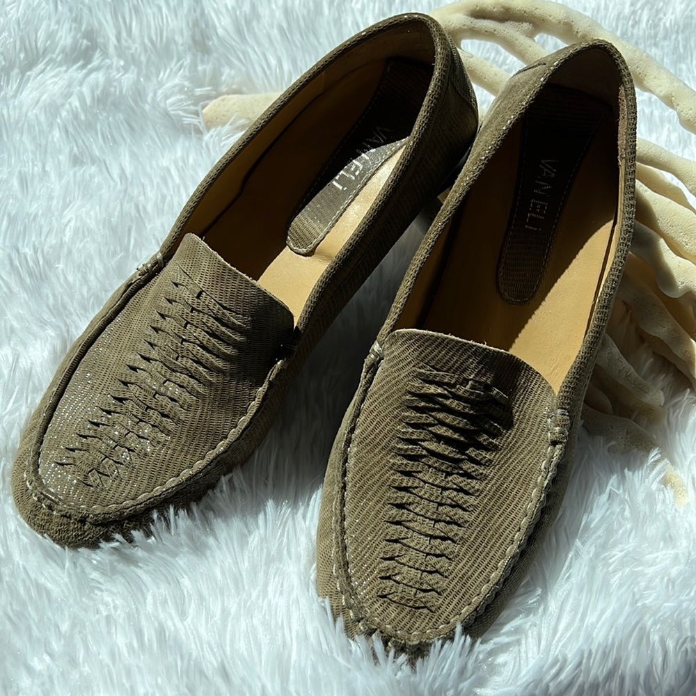 Van Eli Suede Upper with Sparkle. 
Great looking and comfortable